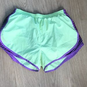 Neon yellow Nike running shorts